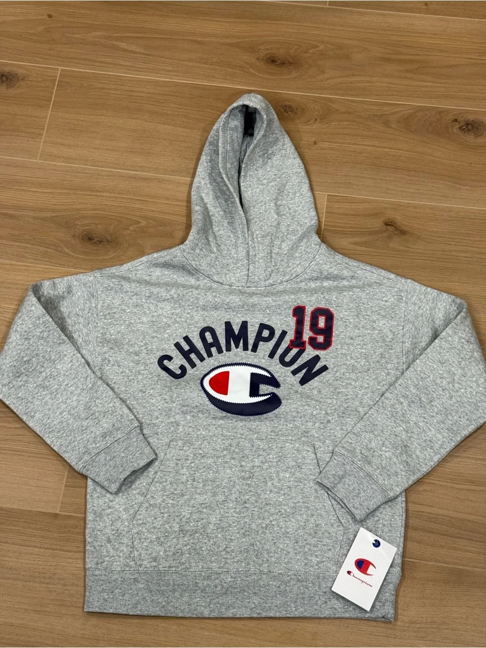 Champion Heather Gray Kids Hoodie with Navy Logo and Red '19 Patch